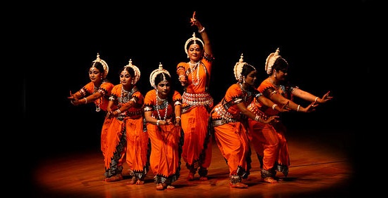 Vibrant cultural event with traditional dance performers